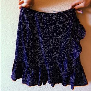 Navy blue and white polka dot mini skirt